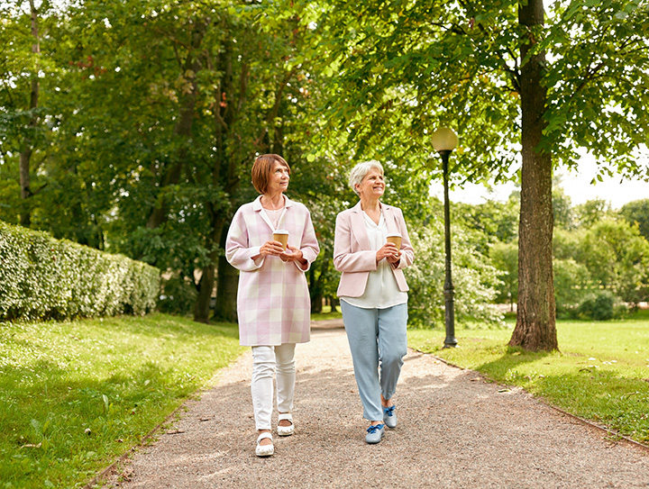 Two people walking outdoors